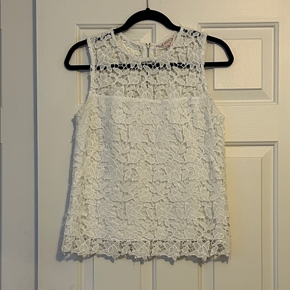 Elegant White Lace Sleeveless Top great for business casual or casual times